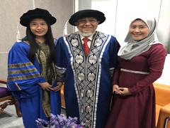A group photo of Dr. Xu and Dr. Mohamad Khan, President of Asia City University